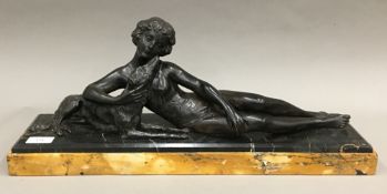 An Art Deco patinated spelter and marble figural group,