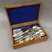 A quantity of silver plated flatware in a canteen