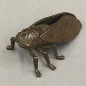 A bronze model of a fly