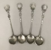 Four Chinese silver coin spoons