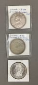 An 1880 United States silver dollar,