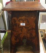 A Victorian pokerwork side table