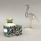 A 19th century Egyptian silver bird constructed by joined calligraphic symbols and a 19th century