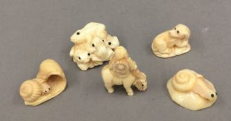 Five carved bone models