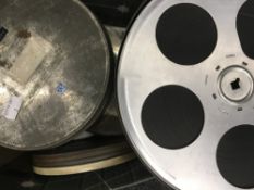 A quantity of vintage film reels