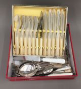 A small quantity of plated flatware