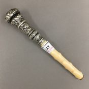 A Victorian silver mounted ivory parasol handle