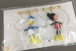 Two vintage 1970s Walt Disney puppets of Mickey Mouse and Donald Duck