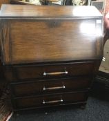 An early 20th century oak bureau