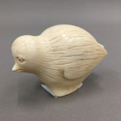 A 19th century carved ivory bird