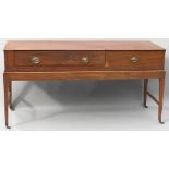 A 19th century mahogany square piano converted to a desk The rectangular top section with two