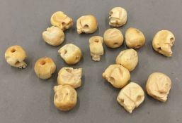 A quantity of carved bone miniature skull beads