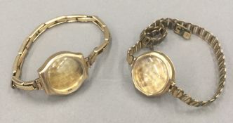 Two 9 ct gold watch cases, each with plated strap (18.