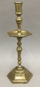 An early bronze candlestick