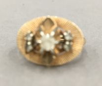 An unmarked gold ring (3.