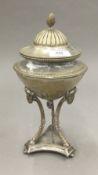 A silver plated urn