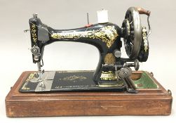 A cased Singer sewing machine