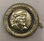 A brass sailors vesta