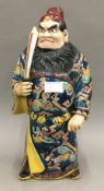 A large 19th century Japanese model of a warrior