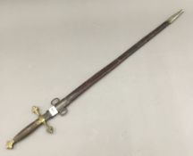 A brass hilt sword and scabbard