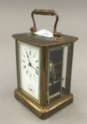 A 19th century carriage alarm clock