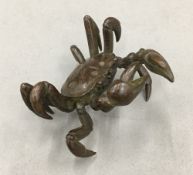 A bronze model of a crab