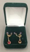 A pair of 9 ct gold stone set earrings