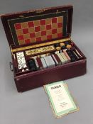 A Victorian leather cased games compendium