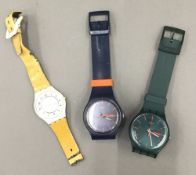 Three vintage Swatch watches