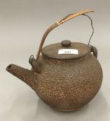 A Japanese terracotta teapot