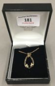 An Edwardian 9 ct gold pendant on chain (4.