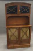 A Victorian glazed walnut cabinet