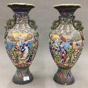 A pair of large decorative Japanese ceramic vases