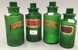 Four 19th century green glass apothecary jars