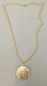 A 9 ct gold locket pendant on plated chain (7.