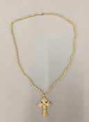 A 9 ct gold and seed pearl cross and chain (9.