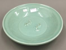 A large Chinese celadon dish