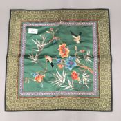 A Chinese embroidered silk panel