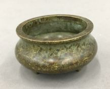 A small Chinese bronze censer