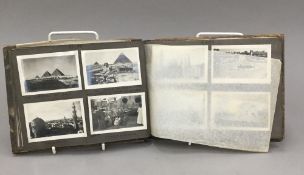 A WWII olive wood photograph album containing scenes of Cairo and Beirut, etc.