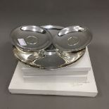 Three Vienna coin set silver dishes,
