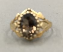 A 9 ct gold stone set ring (1.