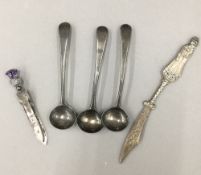 A small quantity of silver spoons and a silver bookmark