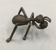 A bronze model of an ant