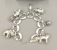 A silver charm bracelet (54 grammes)