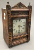 A Victorian oak cased mantle clock