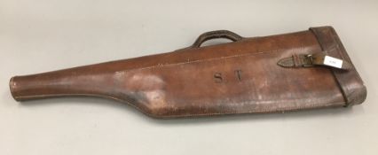 A leather leg of mutton gun case