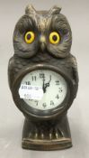 A clock formed as an owl