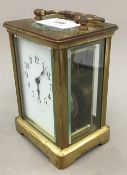 A brass cased carriage clock