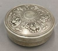 A Chinese silver round box
